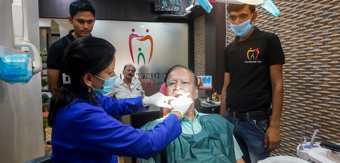 Dr. Neha Implementing the dental implant treatment - best dentist in gurgoan